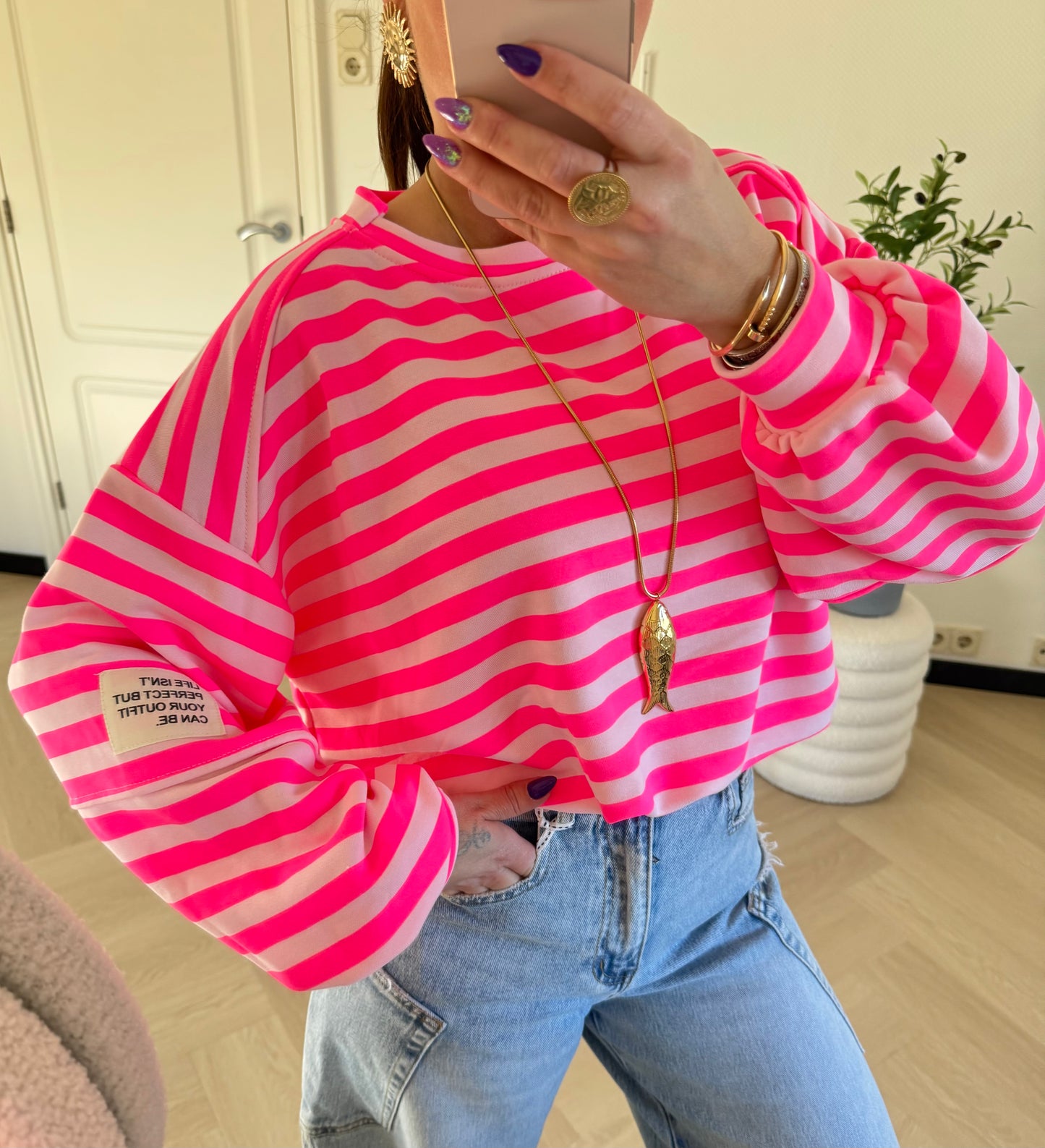sweater etiket roze