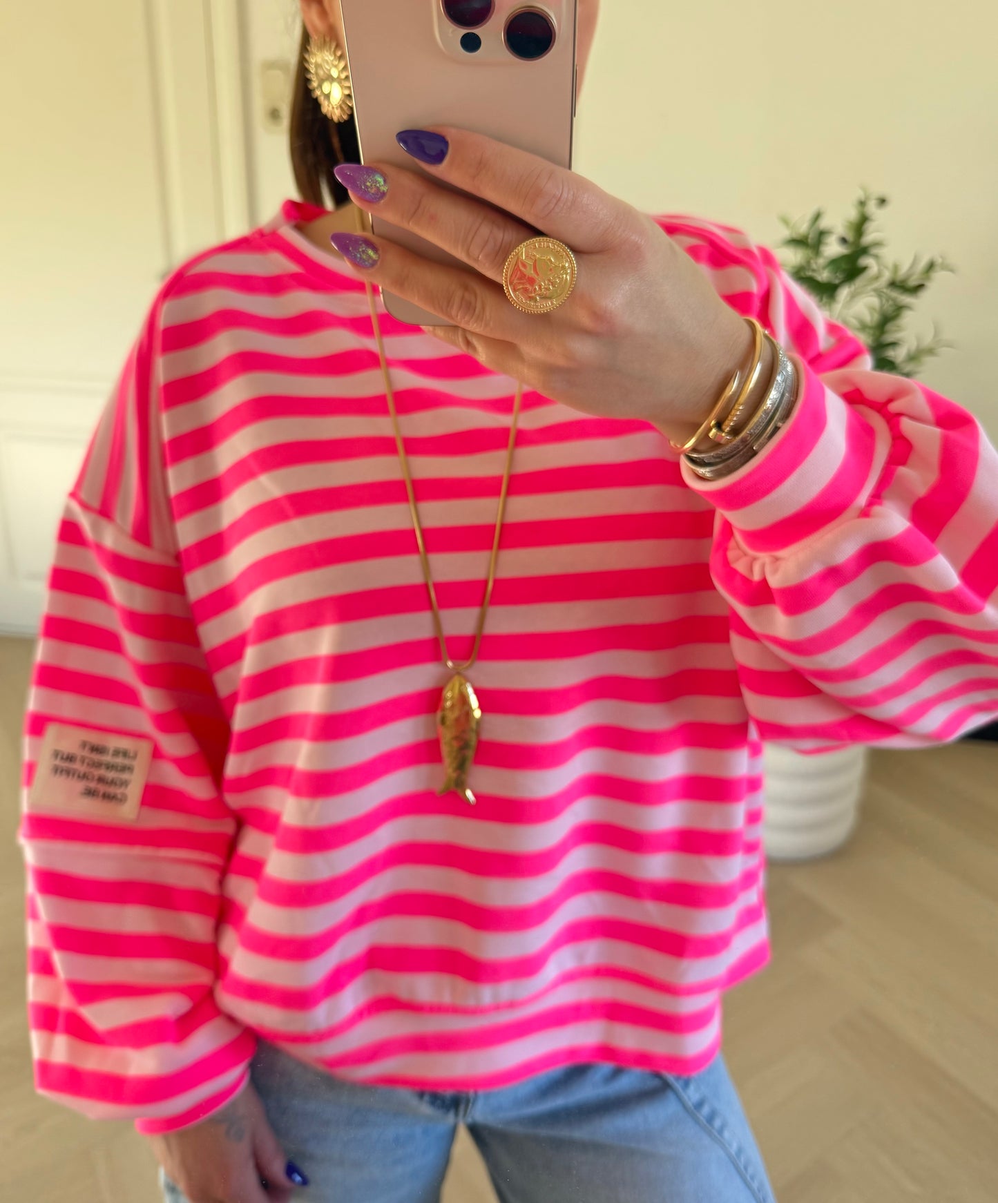 sweater etiket roze